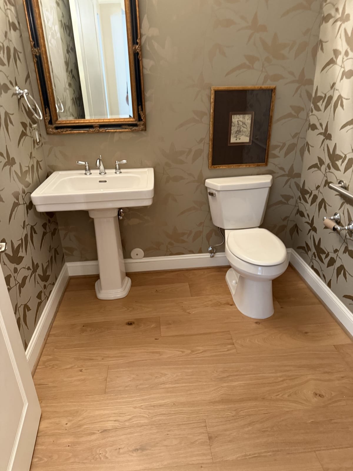 Pedestal sink installed with concealed supply and drain plumbing
