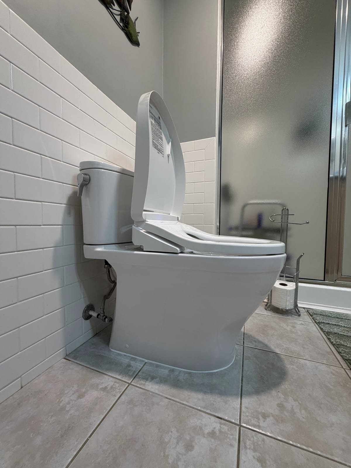 Newly installed Toto toilet with supply line connected