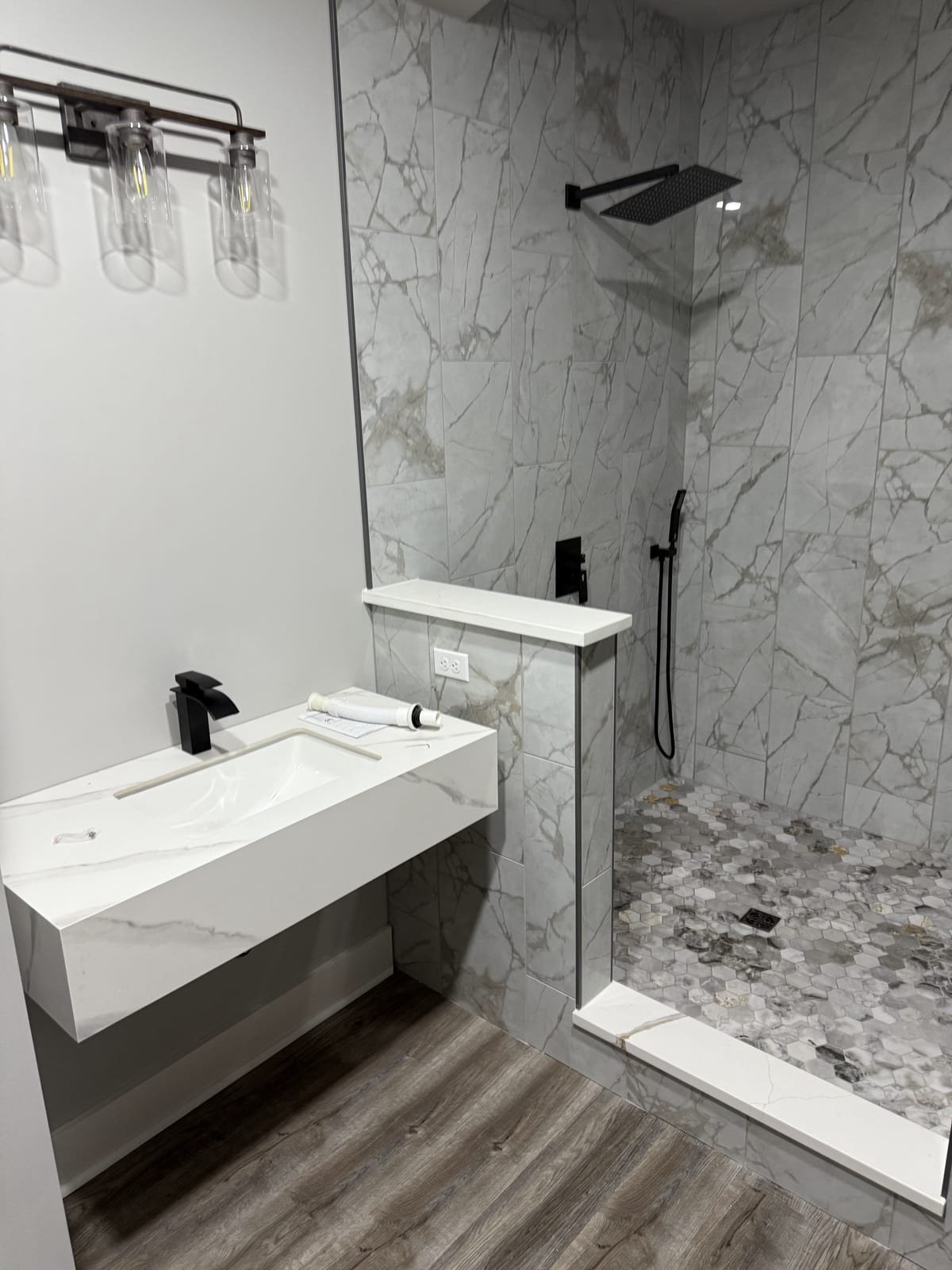 Fully remodeled bathroom with new fixtures, vanity and shower