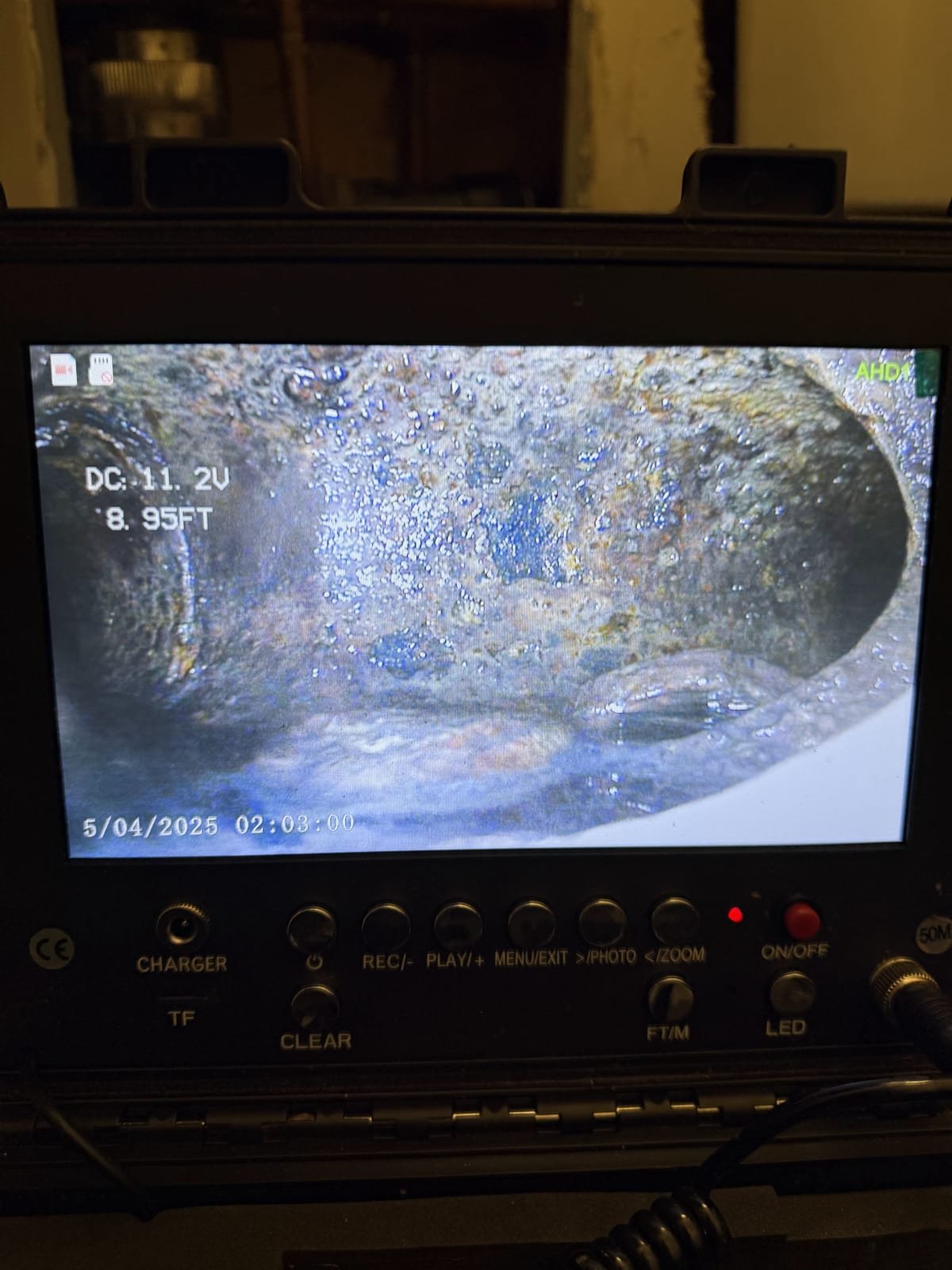 Camera view from inside a drain pipe during a sewer inspection