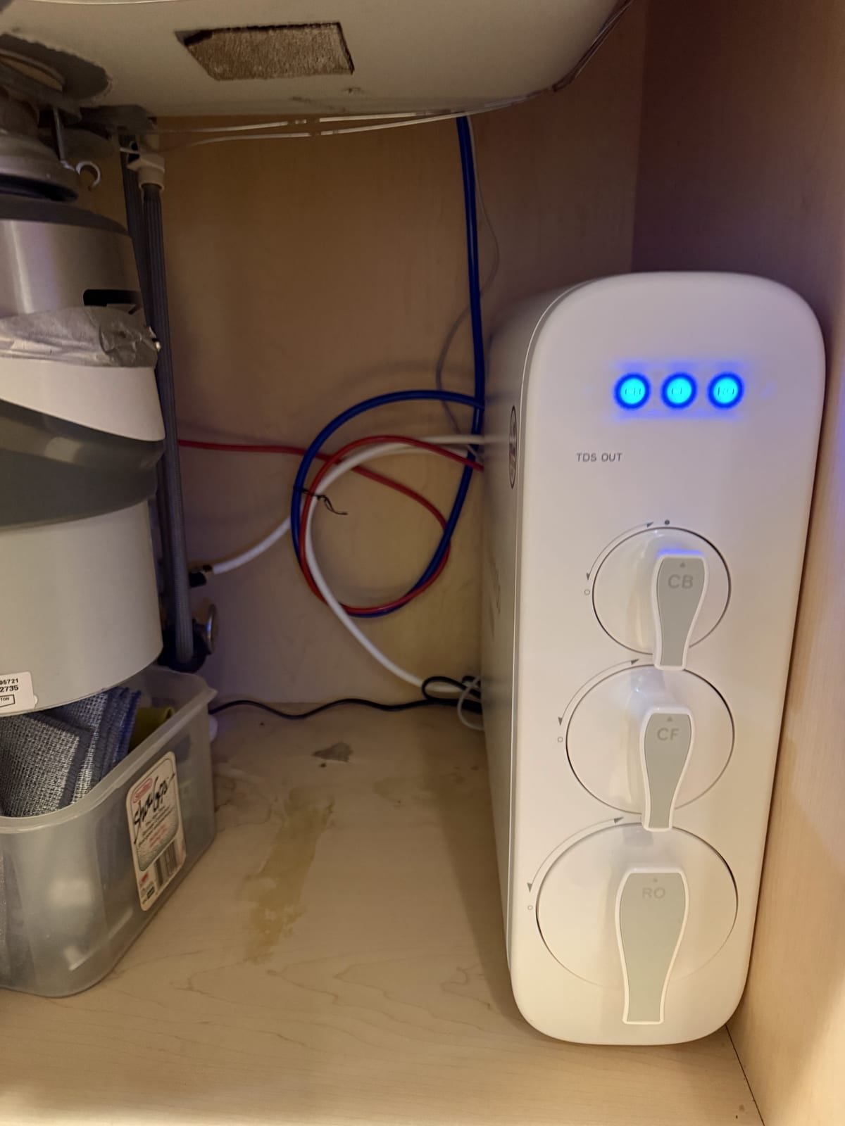 Reverse osmosis drinking water system installed under a kitchen sink
