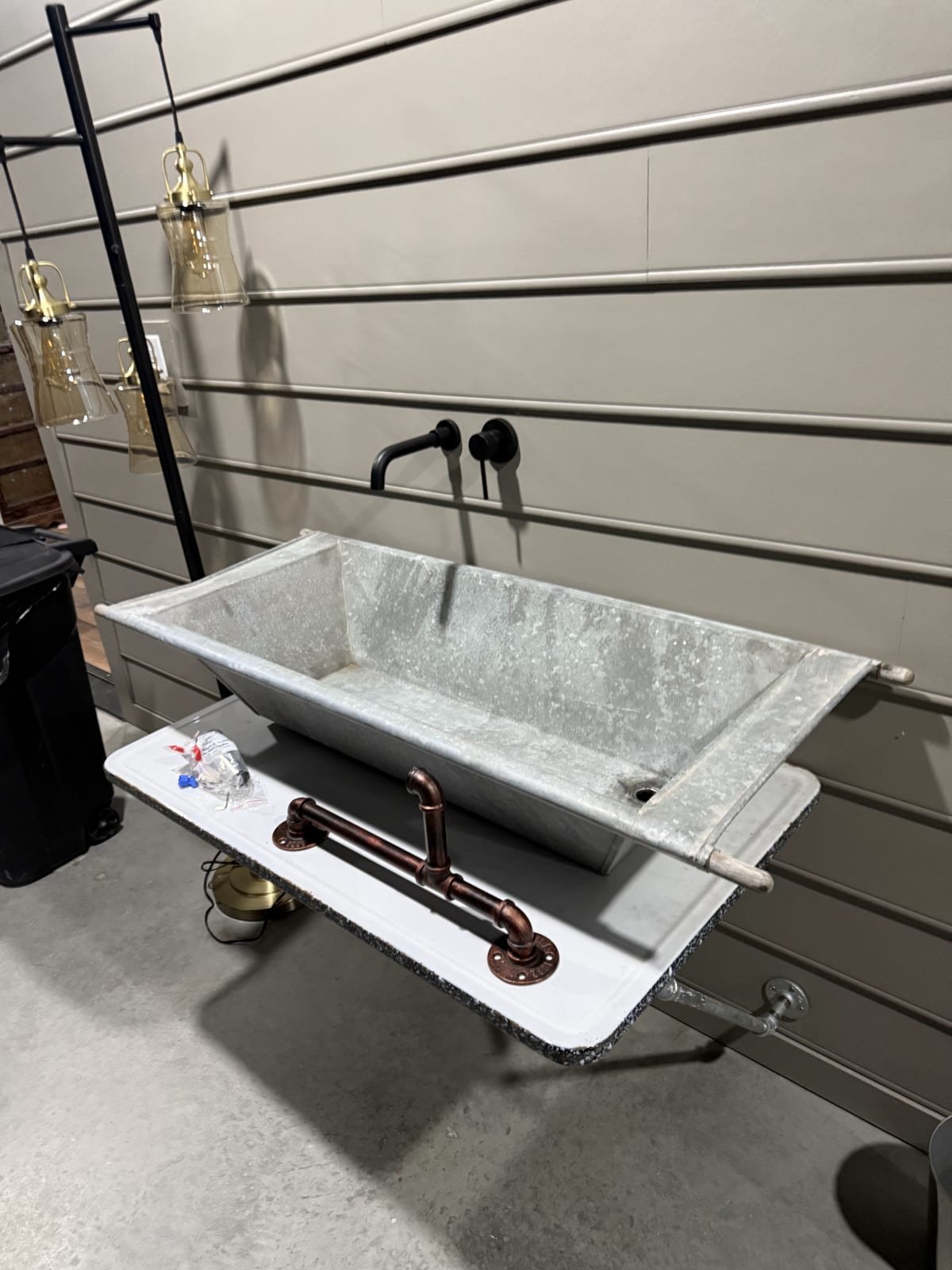 Modern kitchen sink installation with custom faucet