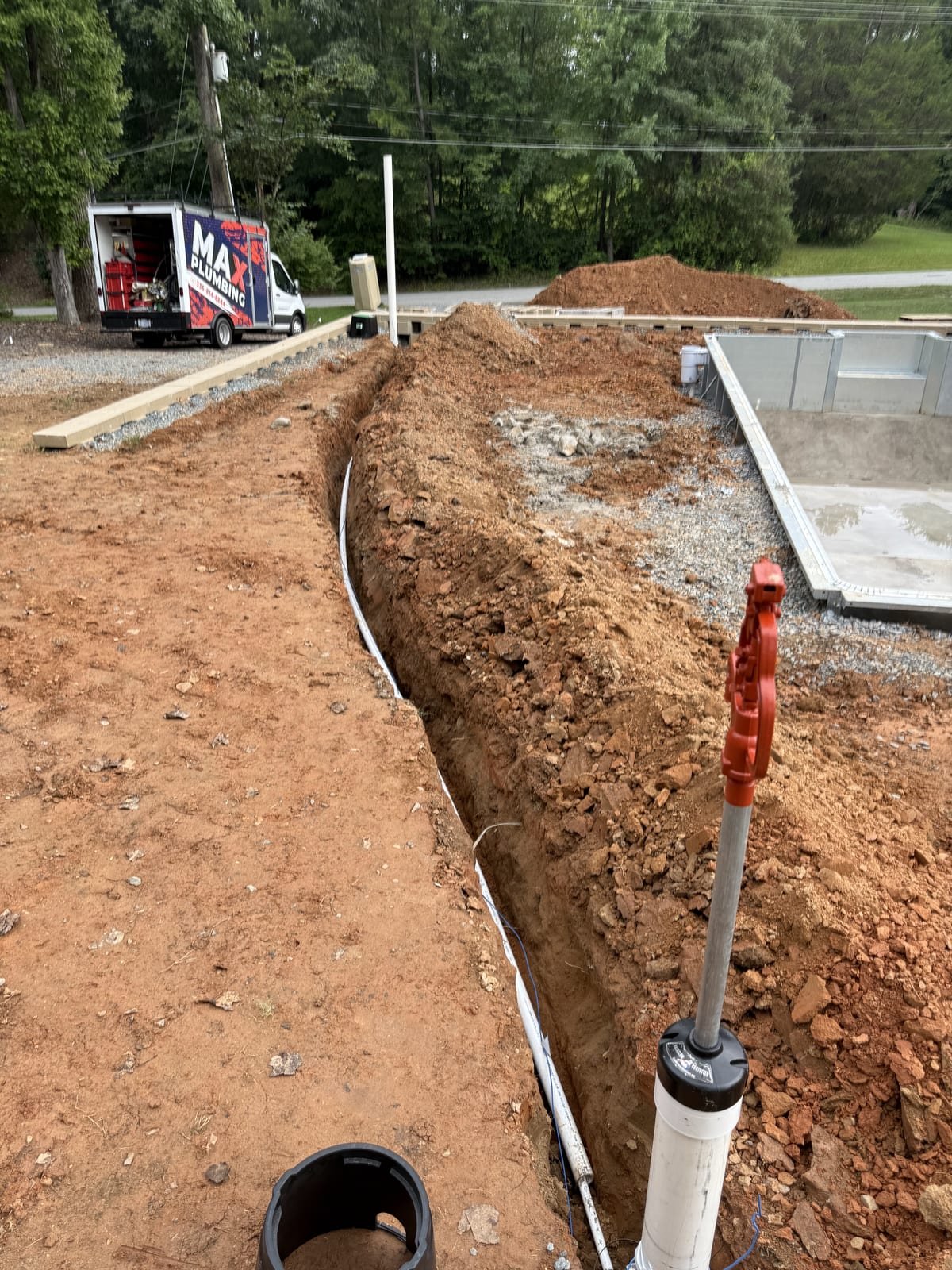 Water line being trenched and run out to a yard hydrant