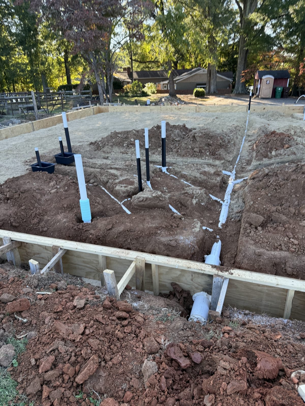 Under-slab drainage piping laid before a concrete pour