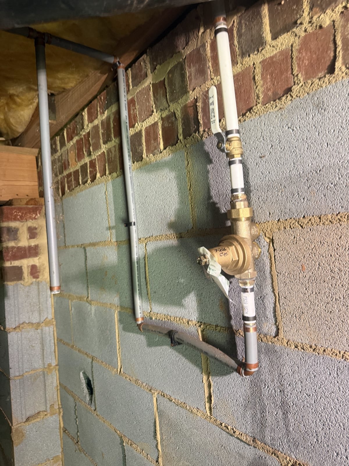 Pressure reducing valve installed on polybutylene supply piping