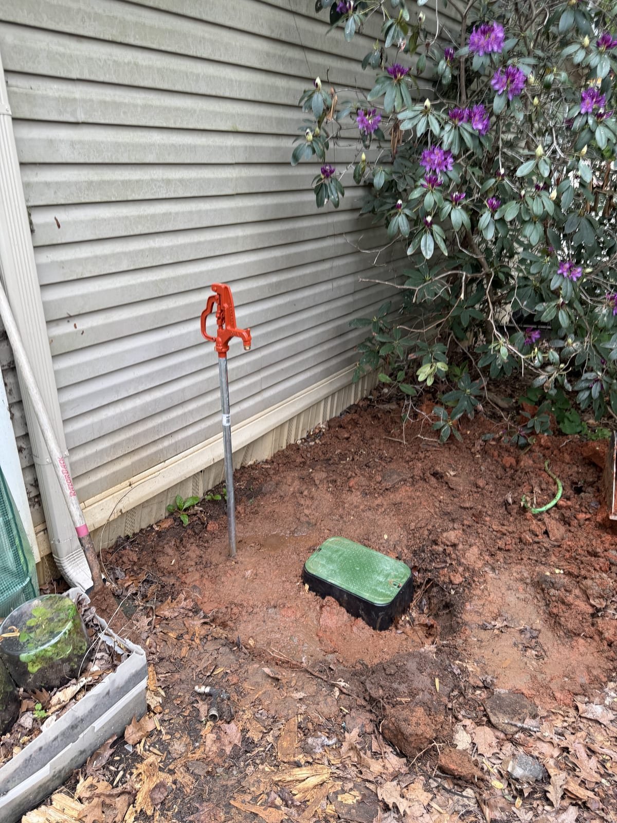 Newly installed frost-free yard hydrant in a finished yard