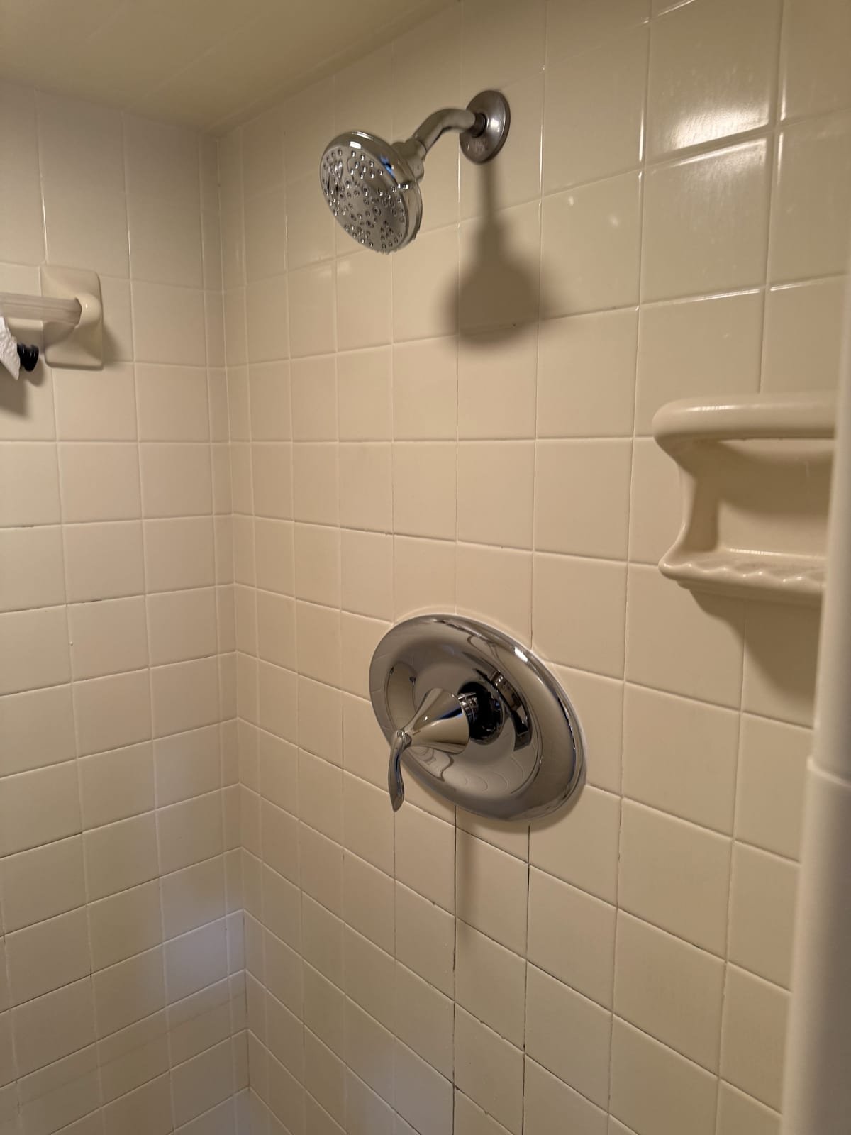 Shower valve being replaced inside an open wall cavity