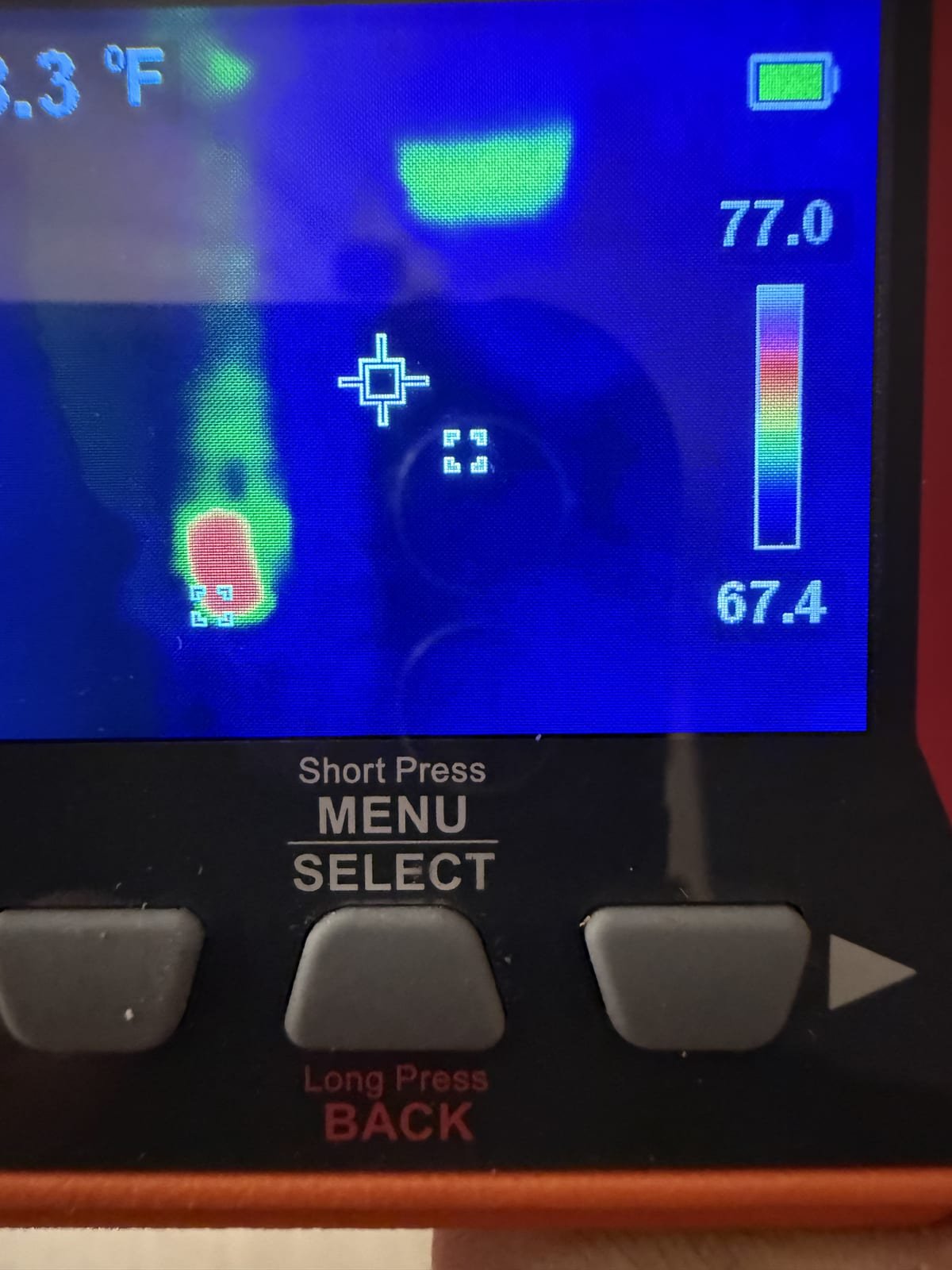 Thermal imaging camera used to inspect plumbing behind a wall