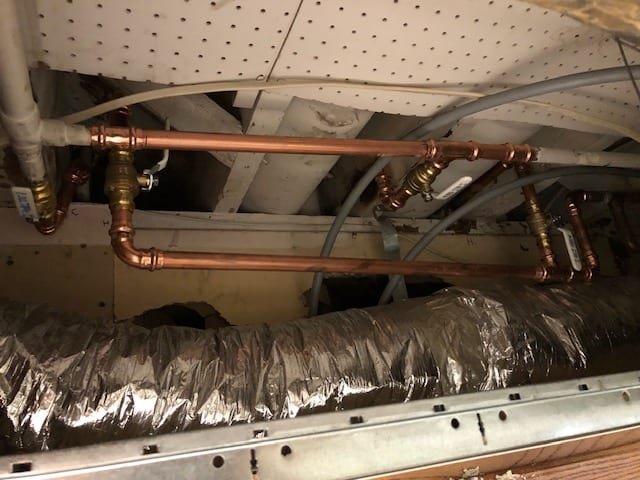 Water supply line repair carried out through an opened ceiling