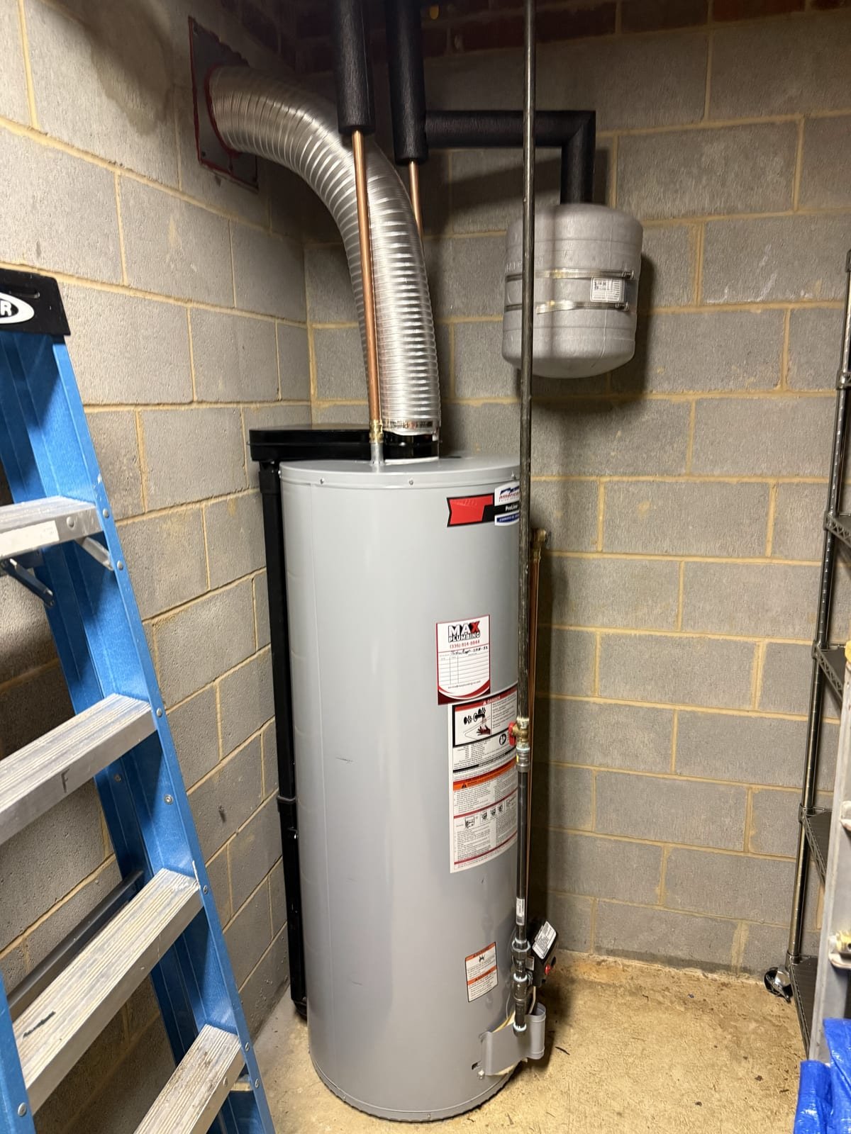 Direct-vent gas water heater installed with sealed combustion venting