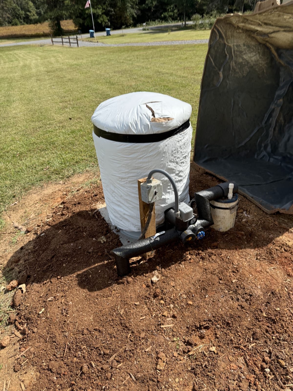Replacement well pressure tank piped into a well system