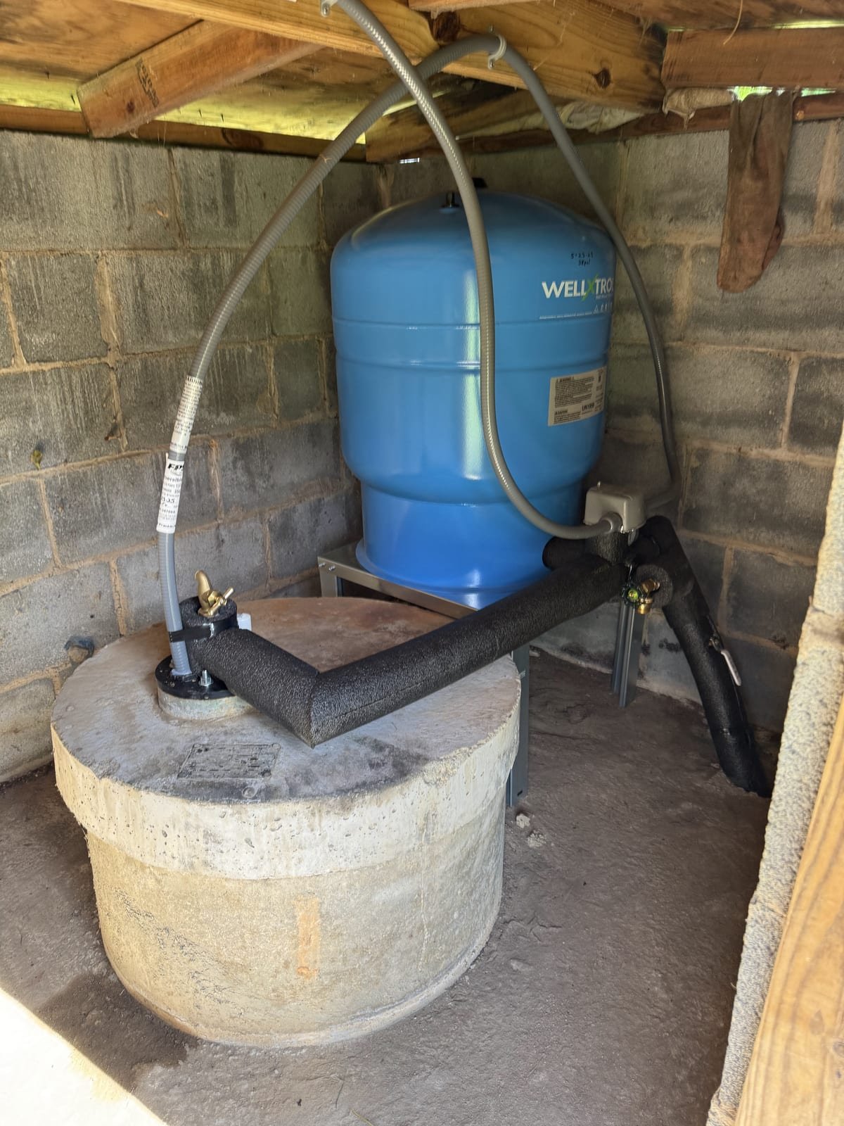 New well pressure tank installed with pressure switch and gauge